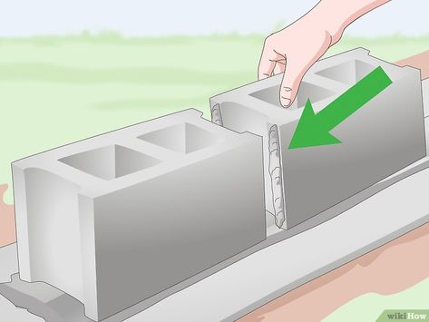 How to Build a Cinder Block Wall (with Pictures) - wikiHow Cinder Block Garden Wall, Wall With Pictures, Building A Brick Wall, Concrete Calculator, Mortar Repair, Concrete Block Foundation, Foundation Ideas, Garden Fireplace, Building A Retaining Wall