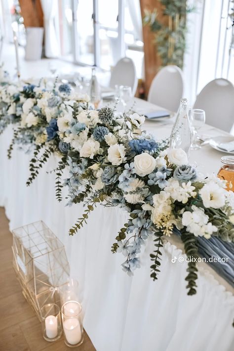 Bride And Groom Table Dusty Blue, Sapphire Wedding Theme Table Settings, Sky Blue Wedding Centerpieces, Blue Themed Wedding Decor, Blue Winter Wedding Centerpieces, Dusty Blue Wedding Tables, Black And Light Blue Wedding Theme, Light Blue Aesthetic Wedding, Blue Flower Wedding Centerpieces