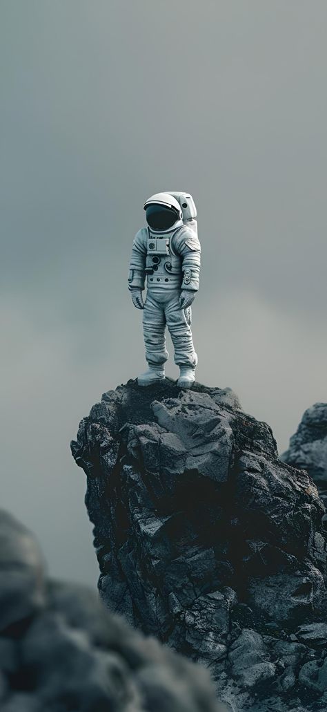 Discover the essence of exploration. Save & follow for more cosmic vibes. An astronaut stands, a beacon of adventure, atop a rugged peak. The horizon fades from light to dark gray, embodying the serene yet unknown vastness of space. It’s a call to the bold and the brave. Own this moment of tranquility and ambition. #explore #space #astronaut #cosmic #adventure #imageprompt #Aiimage Nasa Wallpaper, Space Iphone Wallpaper, Unique Iphone Wallpaper, Iphone Dynamic Wallpaper, Iphone Wallpaper Lights, Astronaut Wallpaper, Iphone Wallpaper Stills, Space Phone Wallpaper, Astronaut Art