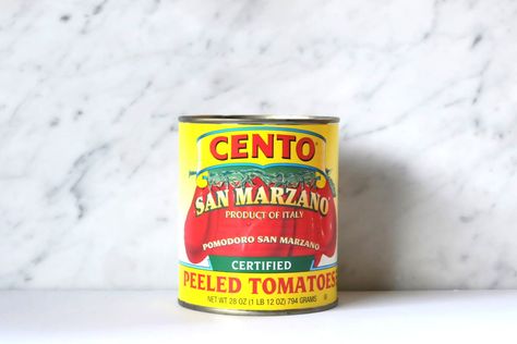 When it comes to canned tomatoes, one name reigns supreme: San Marzano. But how can a small town near Naples, Italy produce enough tomatoes to fill the supermarket shelves year round? Easy — it doesn’t. Here’s what to look for to make sure you aren’t paying premium prices for San Marzano fakes. Gusti Blog offers a few tips from the Cosorzio San Marzano for identifying the real deal when buying San Marzano tomatoes. Best Canned Tomatoes, Pork Cooking Temperature, Marzano Tomatoes, Canning Whole Tomatoes, Varieties Of Tomatoes, Canned Tomatoes, Marinara Sauce Homemade, San Marzano Tomatoes, How To Peel Tomatoes