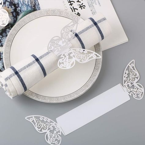 PRICES MAY VARY. Paper Hollow butterfly pattern design, makes your wedding shinny and vivid It will make the napkin more beautiful and nature Add romance and sentiment to your table Material: paper Dimensions: 13.1 x 3.4cm / 5.2'' x 1.3'' Material: Paper   Dimensions: 13.1 x 3.4cm / 5.2'' x 1.3''   Ring diameter: 4.5cm/1.8''   Weight: 130g   It is a nice embellishment for napkin, simple and practical   It is specially designed for a wedding or family reunion   It makes napkin so natural and beau Wedding Bridal Table, Butterfly Napkin Rings, Paper Napkin Rings, Fest Temaer, Laser Cut Paper, Ring Holder Wedding, Butterfly Wedding, Dinner Decoration, 3d Butterfly