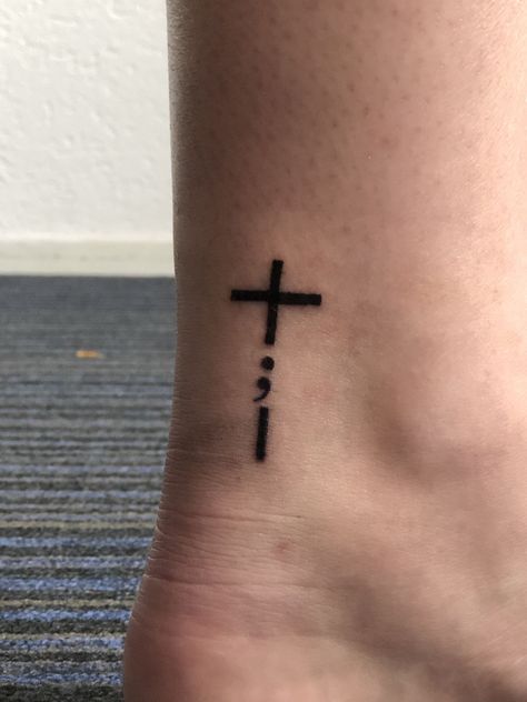 Cross Semi Colon Tattoo, Cross Stick And Poke Tattoo, Finger Tattoos Semicolon, Cross Henna Tattoo, Cross And Semi Colon Tattoos For Women, Cross And Semicolon Tattoo, Cross Semicolon Tattoo, Ankle Tattoo Small Meaningful, Cross On Ankle Tattoo