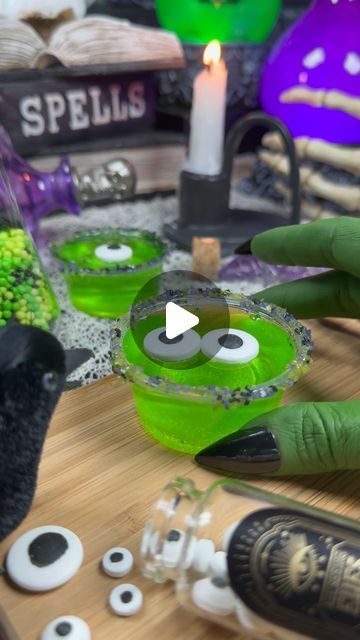 Jamie Kirchner | Holiday Inspo on Instagram: "Eye of Newt Jelly Shots

This jelly shot kit from @fancyspinkles is available at Walmart, and a Halloween party in a box! Everything you need is included - lime gelatin, plastic cups, edible glitter, sugar sprinkles, and candy eyeballs. Substitute water for tonic water for a fun glittery glowing effect! 

#halloweenparty #spookyseason #fancysprinkles #halloweendrinks" Edible Glitter Sugar, Eye Of Newt, Edible Eyes, Jello Cups, Jelly Shots, Candy Eyeballs, Fancy Sprinkles, Glowing Effect, Holiday Inspo