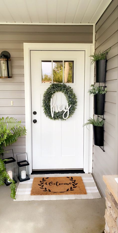 Front Door In Corner Of Porch, Front Door Decor Small Porch, Off Center Front Door Porch Decor, Front Door Entrance Apartment, Exterior Front Door Decor Ideas, One Side Porch Decor, Front Door Ideas Small Space, Front Porch Decor Small Entryway, Outside Front Door Entryway Ideas Modern