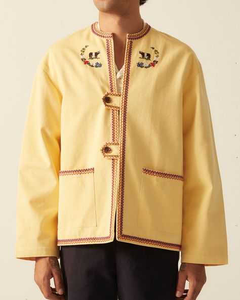 This coat is inspired by children’s alpine souvenirs, circa 1960s. This jacket features Edelweiss and alpine motifs which became popular on Alpine souvenirs in the 1960s.   Boxy fit   Two front buttons  Two front pockets 100% cotton Made in India Dry clean only View all outerwear All wear, mending, and idiosyncrasies a Cow Jacket, Embroidered Cow, The 1960s, 1960s, Cow, Shirt Designs, Coats Jackets, Textiles, India