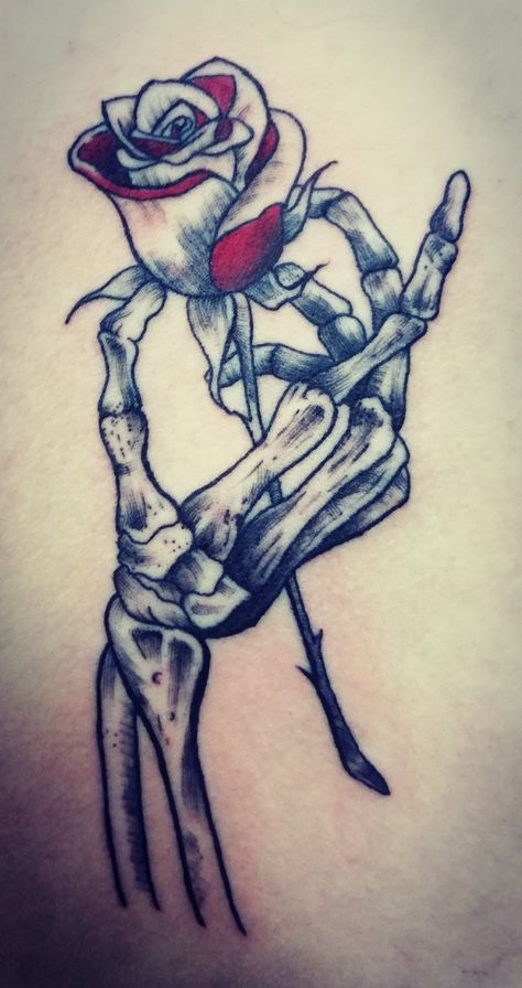 #tattoo #rose #skeleton hand #skeleton #backtattoo #coloredtattoo #inkstingttattoo Skeleton Hand Rose, Rose Skeleton, Virgo Tattoo Designs, Hand Skeleton, Side Hand Tattoos, Skull Rose Tattoos, Skull Hand Tattoo, Lion Tattoo Sleeves, Skeleton Tattoos