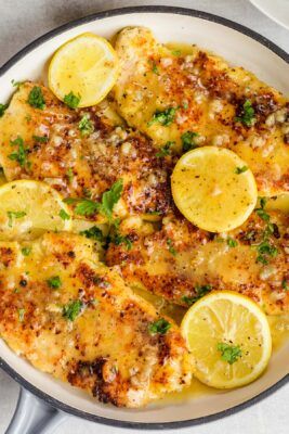 Lemon Chicken with BEST Lemon Butter Sauce - NatashasKitchen.com Lemon Chicken Tacos, Lemon Chicken Sauce Recipe, Low Carb Lemon Chicken Recipes, Lemon Chicken Parmesan Recipe, Simple Sauces For Chicken, Eager 2 Motivate Meals, Main Food Dish, Parmesan Lemon Chicken, Chicken Rillettes Recipe