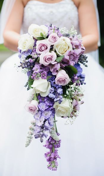 23 Most Incredible Cascading Wedding Bouquet Ideas, purple weddings. #weddingbouquet #cascadingweddingbouquet #waterfallweddingbouquet #weddingflowers Colorful Bridal Bouquet, Wedding Bouquet Ideas, Purple Bouquets, Purple Bridal Bouquet, Cascading Bridal Bouquets, Cascading Wedding Bouquets, Purple Wedding Bouquets, Purple Wedding Theme, Rose Bridal Bouquet