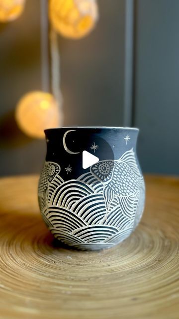 Ceramic Artist, Zahava Friedman on Instagram: "Many of my designs are derived from hundreds of hours doodling in school, which explains a lot about my knowledge of history and math 😆 “Fish dreams” Wheel thrown ceramic mug with freehand sgraffito. . . . #muglovers #wheelthrownmugs #sgraffitopottery #sgraffitoceramics #fishart #fishdesign #freehandart #amacovelvetunderglaze #carvedclay #handmadepottery #potterylovers #mugcollection #illustratedceramics #potterymug #ceramicmug #cerámicas #makers #clayarts #functionalart #shophandmade #ceramilicious" Scrafito Designs, Scrafito Pottery, Sgraffito Designs Easy, Sgraffito Fish, Sgraffito Designs, Sgraffito Pottery, Ceramic Crafts, Wheel Thrown Ceramics, January 3