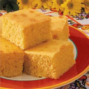 Best corn bread recipe ever! Super simple to make!  Buttery Corn Bread Recipe Prep: 15 min. Bake: 25 min. Yield: 12-15 Servings 15 25 40 Ingredients 2/3 cup butter, softened 1 cup sugar 3 eggs 1-2/3 cups 2% milk 2-1/3 cups all-purpose flour 1 cup cornmeal 4-1/2 teaspoons baking powder 1 teaspoon salt Buttery Cornbread Recipe, Buttery Cornbread, Buttery Corn, Sweet Cornbread, Christmas Foods, Corn Bread Recipe, Crumpets, Taste Of Home, Bread Dough