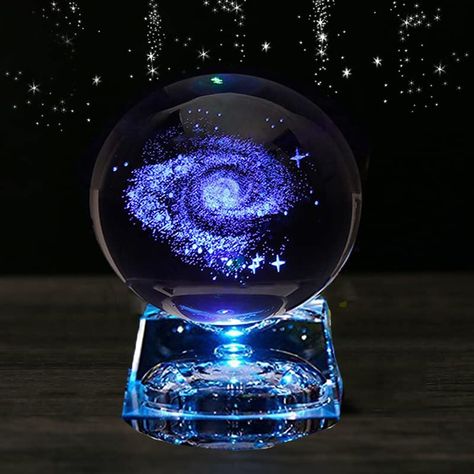 PRICES MAY VARY. This galaxy glass ball is made of premium crystal material,completely transparent and no bubbles,best decoration for any place,show an artistic and elegant style to your bedroom,living room and office Galaxy in glass Comes together with a crystal LED lighting Base(button cells included),emits uninterrupted bright light with multicolor changing alternately,makes this galaxy ornament to be a magical and pocket edition galaxy in the room Use advanced 3D Inner carving and flame extr Luxury Birthday Gifts, Art Glass Ornaments, Technology Gifts, Magic Gift, Gift For Anniversary, Blue Aesthetic Pastel, Glass Ball Ornaments, Gifts Teacher, Witch Decor