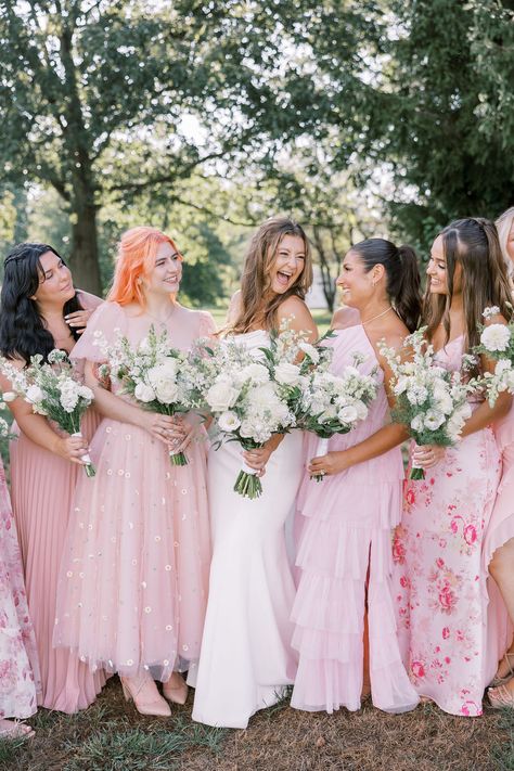 These stunning bridesmaids prove that a mix-and-match palette of pink dresses brings out the perfect blend of romance and elegance. Imagine celebrating love in a beautifully intimate setting, surrounded by nature’s charm and the warmth of loved ones. Explore how a private property wedding can offer a unique, personal touch to your big day! Pink Bridesmaid And Groomsmen, Bridesmaid Dresses Mismatched Pink, Mismatched Bridesmaid Dresses Pink, Mismatched Blush Bridesmaid Dresses, Pink Bridesmaid Dresses Mismatched, Mix And Match Bridesmaids, Property Wedding, Private Property Wedding, Mix Match Bridesmaids