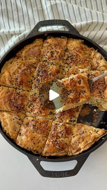 hind kasem on Instagram‎: "egyptian goulash (phyllo cheese pie) 🇪🇬   egyptian goulash is a baked phyllo pastry that’s filled with ground meat, cheese or vegetables and coated in a milk-egg wash, which gives it a soft texture while maintaining the crispy layers. goulash is a common dish on ramadan iftar spreads—i shared my ground beef goulash recipe last year and it went viral (for obvious reasons) but this cheese one is even better! it’s soft and slightly briney and is great to make in advance. i made it in my @lodgecastiron and love the incredible crust it gave it!   16 oz mozzarella, shredded  8 oz feta cheese (desalinated) 1 tbsp black seed  2 @vitalfarms eggs, beaten  #4 sheets of phyllo pastry 1 stick salted butter 1/4 cup olive oil 1 @vitalfarms egg, beaten  1 cup milk sprinkle of Egyptian Goulash, Ground Beef Goulash, Egyptian Recipes, Pie Pastry Recipe, Phyllo Recipes, Phyllo Pastry, Cheap Vegan Meals, Lenten Recipes, Cheap Vegan