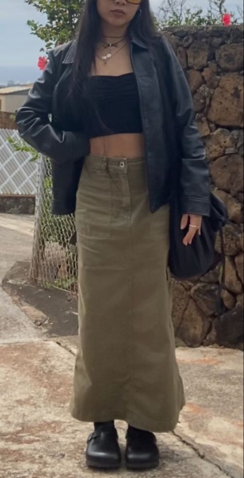 Army green cargo skirt outfit, black leather jacket, crossbody bag, birkenstock boston clogs styled, black boston clogs outfit, layered necklaces, layered jewelry, sunglassws, collored sunglasses, black tube top, ootd, day fit, rings, style inspo, spring fashion trends, spring 2023, thrifted outfit, thrifting inspo, thrifting, thrifted, trendy outfit, maxi skirt, midi skirt, long skirt Green Cargo Maxi Skirt Outfit, Army Green Cargo Skirt, Maxi Green Skirt Outfit, Army Green Maxi Skirt Outfit, Green Cargo Maxi Skirt, Dark Green Maxi Skirt Outfit, Long Cargo Skirt Outfit Y2k, Long Green Cargo Skirt Outfits, Long Green Cargo Skirt