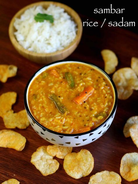 sambar rice recipe | sambar sadam recipe with step by step photo recipe. basically, sambar rice is combination of rice and sambar which is cooked with vegetables. in other words, sambar rice is prepared by cooking together the lentils, vegetables rice and sambar powder. due to its simplicity and amazing taste, it is very popularly served for breakfast, lunch and dinner with tomato onion raita.