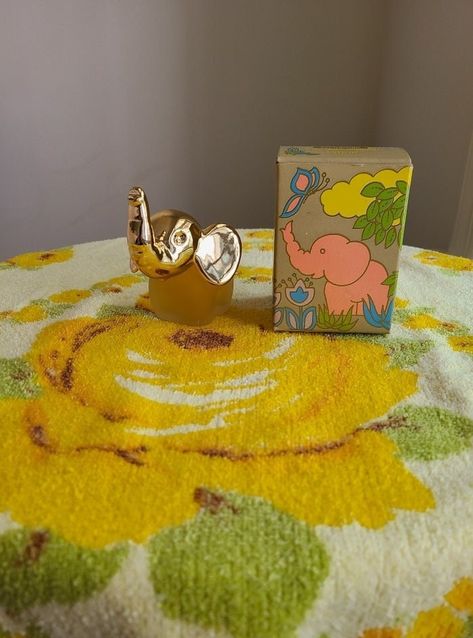 "Adorable vintage Avon elephant perfume bottle with Avon Patchwork cologne. Never been used! Comes with original packaging which is also in great shape.  -1.5 Fl. Oz.  -Released in 1974 -Perfume bottle is approximately 4\" tall -Minor \"defect\" on bottle- small scratch on bottle (see 2nd to last picture) -Sold as is" Elephant Patchwork, Good Luck Elephant, Avon Collectibles, Avon Perfume, Avon Vintage, Vintage Perfume, Toiletry Storage, Vintage Avon, Unique Animals