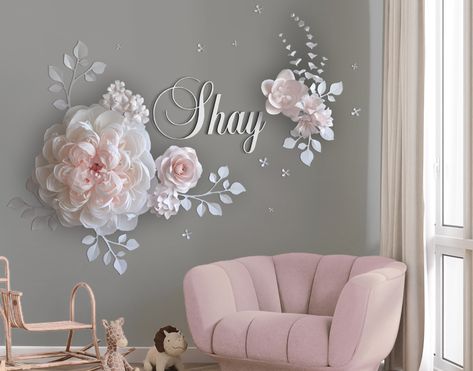 "Large paper flowers for wall decor around baby name sign placed above a crib is a lovely idea for nursery. This set of blush, pink and white paper flowers deeply amazes everybody who see it, because it is implemented by the most luxurious flowers - peonies. What could be softer and more sophisticated than pinkish white foam of hundreds petals assembled into exquisite posh peonies? All these ball shaped forms of fully and half opened flowers with buds magnetize your eyes and make our hearts melt Flower Wall For Nursery, Peony Nursery Theme, Name Sign With Flowers, Paper Wall Flowers, Luxurious Flowers, Paper Flowers Large, Peony Nursery, Orchid Corsages, Large Paper Flower