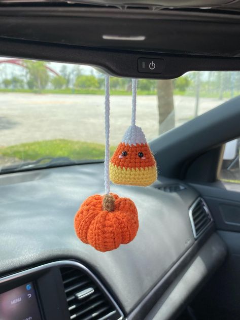 Crochet Pumpkin And Candy Corn Car Charm, Cute Candy Corn Pumpkin Rear View Mirror Ornament, Fall Halloween Car Accessories Fall Car Decor CROCHET CANDY CORN PUMPKIN CAR ACCESSORY Materials: This cutie candy corn and pumpkin car pendant is crocheted with natural cotton yarn, soft for skin, safe eyes.  Cute candy corn pumpkin car accessories a meticulously handcrafted by hand This Halloween car ornament dimension: The pumpkin measures 2.5 inches in tall and the pumpkin measures 1 inches in wide C Crochet Candy Corn, Halloween Car Decorations, Candy Corn Pumpkin, Crochet Pour Halloween, Pumpkin Candy Corn, Fall Crochet Patterns, Crochet Car, Adornos Halloween, Crochet Goodies