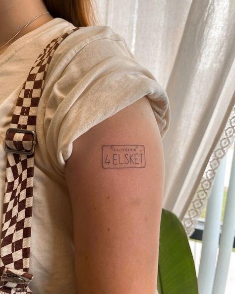 License Plate Tattoo Small, Nine Lives Tattoo, Back To The Future Tattoo Small, 5 Person Tattoo Ideas, Supernatural License Plate Tattoo, License Plate Tattoo Ideas, Minimalist Movie Tattoo, House Number Tattoo, Number Plate Tattoo