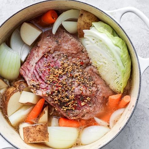 Corned Beef and Cabbage - your classic boiled dinner for St. Patrick's Day! A tried and true, go-to recipe that we have been making for decades! #stpatricksdayrecipe #cornedbeefandcabbage #cornedbeefandcabbagerecipe #howtomakecornedbeefandcabbage #cornedbeefandcabbageeasy Dutch Oven Corned Beef, Oven Corned Beef, Ham And Cabbage Soup, Corned Beef And Cabbage Recipe, Beef And Cabbage Recipe, Wooden Skillet, Main Entree Recipes, Boiled Dinner, Cooking Corned Beef