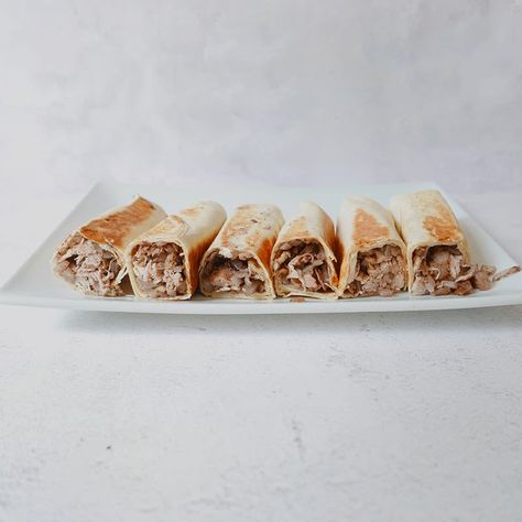 Msakhan (Soumak Chicken) Rolls by Ahmad Alzahabi | Recipes | WW USA Ahmad Alzahabi, Chicken Rolls, Skinless Chicken Thighs, Chicken Stock, Chicken Thighs, Chicken Broth, Serving Size, Pita, Loved Ones