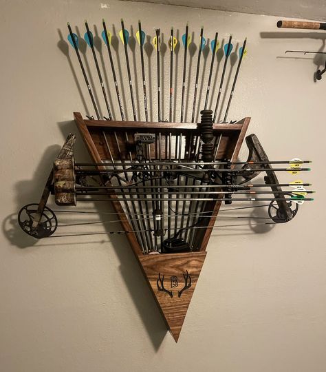 Custom wood bow and Arrow holder.   Holds 12 arrows and stores your bow so you can look at it year round!  Can have custom antlers engraved on front or leave it blank. Archery Decorations Ideas, Diy Bow Holder Archery, Hunting House Decor, Bow And Arrow Holder, Hunting Bow Holder, Wood Bow And Arrow, Compound Bow Holder, Arrow Holder, Diy Bow Holder