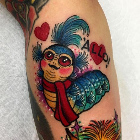 Roberto Euán on Instagram: “♥️🐛Little 'Allo worm from The Labyrinth. I giggled the whole time I tattooed this! Thank you Kirby!! 💕💕💕 #thelabyrinth #wlba” Ludo Labyrinth Tattoo, Labyrinth Worm Tattoo, Musicals Tattoo, Labyrinth Tattoo Ideas, Land Before Time Tattoo, Labyrinth Ideas, Movie Tattoo Ideas, Worm Tattoo, Shin Tattoos