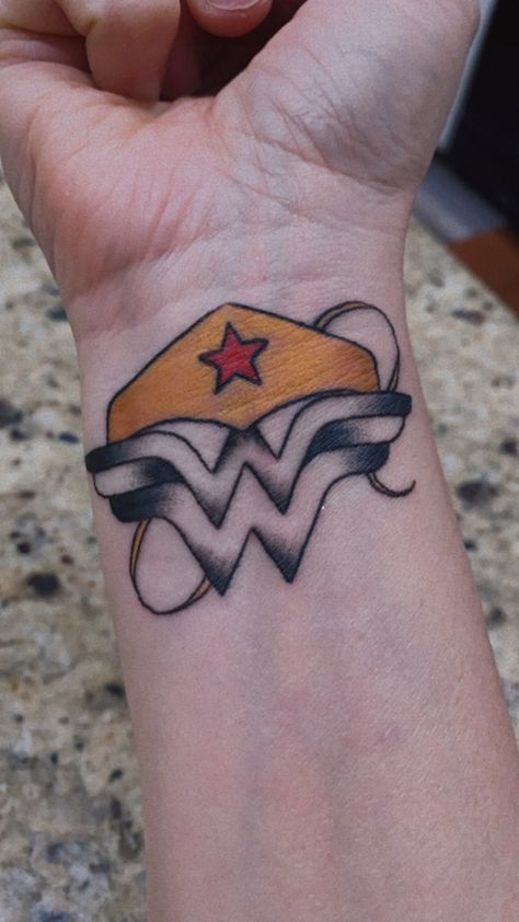 Small Wonder Woman Tattoo, Wonder Woman Logo Tattoo, Manifest List, Hunger Games Tattoo, Captain America Tattoo, Wonder Woman Tattoo, Bike Tattoo, Flamingo Tattoo, Evil Eye Tattoo