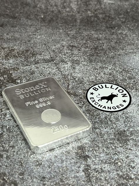 Bullion Exchanges now provides the 2022 Niue 250 gram Stonex Silver Coin Bar! This beautiful bullion coin bar contains 250 grams of .9999 fine silver and arrives with a glossy finish. This rectangular coin bar was produced by StoneX Group Inc- an iconic American firm as well as a publicly traded financial services company. Make sure to add this 2022 Niue 250 gram Stonex Silver Coin Bar to your portfolio today! Coin Bar, Buy Gold And Silver, Bullion Coins, Silver Bullion, Silver Prices, Silver Coin, Rare Coins, Silver Bars, Buy Gold