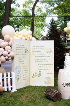 Winnie the Pooh Storybook Backdrop from a Hundred Acre Wood Winnie the Pooh Party on Kara's Party Ideas | KarasPartyIdeas.com (34) Woods Baby Shower Theme, Barrel Cake Table, Storybook Backdrop, Shelf Cute, Honey Jar Favors, Winnie The Pooh Party, Fairytale Theme, Barrel Cake, Pooh Party