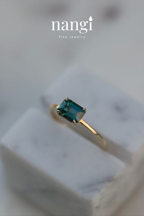 Gemstone Ring. Rectangular, teal sapphire set in our east-west setting. Gold Ring Band, Teal Sapphire, East West, Yellow Gold Ring, Ring Band, Ring Designs, Gold Ring, Band Rings, Gold Rings