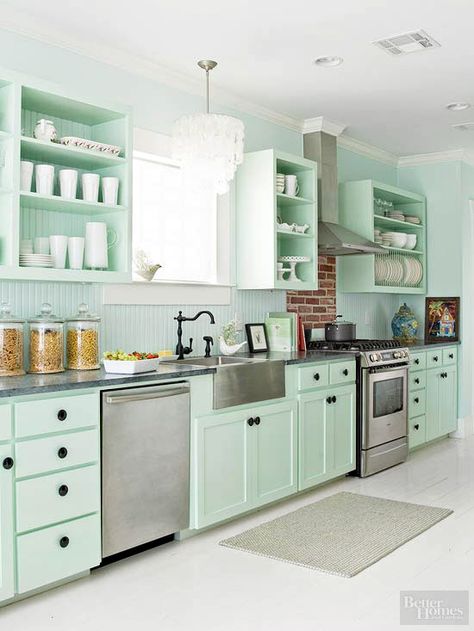 Add a personal element to your kitchen by painting cabinetry. Mint Green Kitchen, Mint Kitchen, Green Kitchen Designs, Desain Pantry, Cottage Style Kitchen, Kabinet Dapur, Green Kitchen Cabinets, Casa Vintage, Green Cabinets