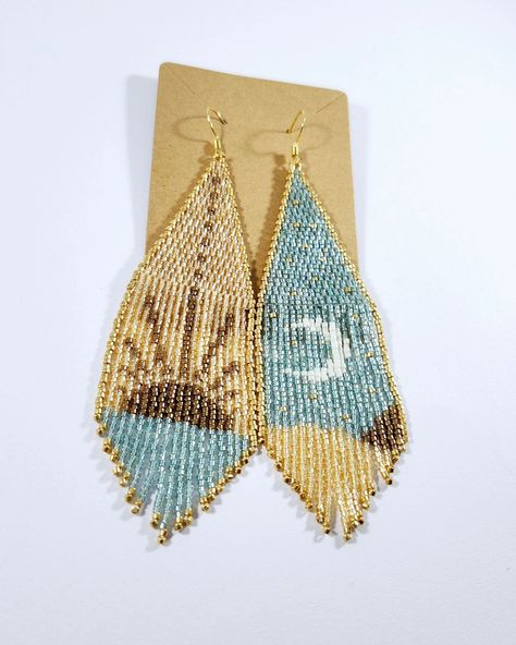 Have you visited the Bees Love Shop recently?? Lots of new beautiful beaded jewelry. Like these statement earrings hand crafted with love. Truly one of a kind! Visit beelovehandmade.etsy.com 🐝💕 Donating to help save the bees. XOXO ___.___ ---•--- #HandmadeJewelry #ArtisanJewelry #HandcraftedJewelry #JewelryDesign #UniqueJewelry #JewelryMaker #SupportSmallBusiness #SmallBatchJewelry #SaveTheBees #BeeConservation #BeesAreImportant #Pollinators #BeeLove #BeeFriendly #ProtectTheBees #BeeAware #B... Bee Conservation, Stars Earrings, Sun Moon And Stars, Beautiful Beaded Jewelry, Bead Dangle Earrings, Moon And Star Earrings, Asymmetrical Earrings, Bee Friendly, Night And Day