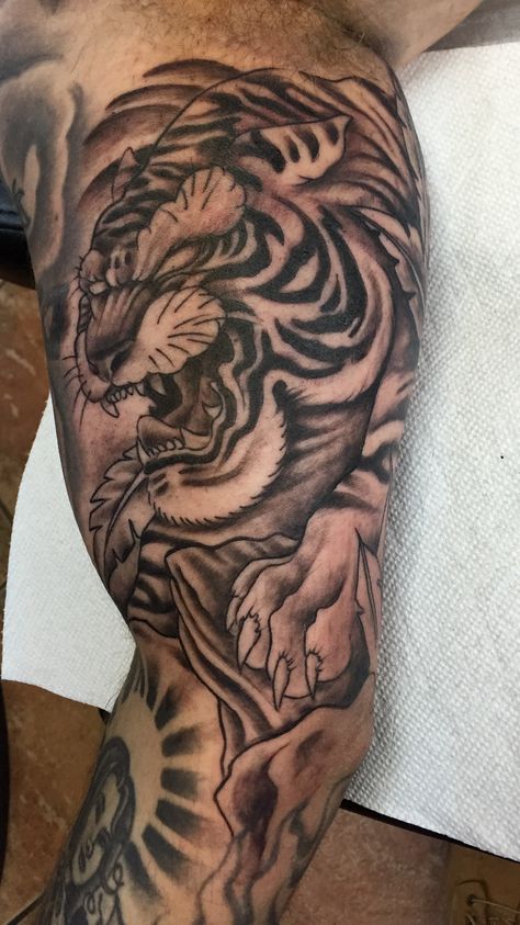 B Inner Bicep Tattoo Men, Dragon Tiger Tattoo, Elephant Tattoo Meaning, Japanese Tiger Tattoo, Tiger Tattoo Sleeve, Bicep Tattoo Men, Inner Bicep Tattoo, Samurai Tattoo Design, Lion Head Tattoos