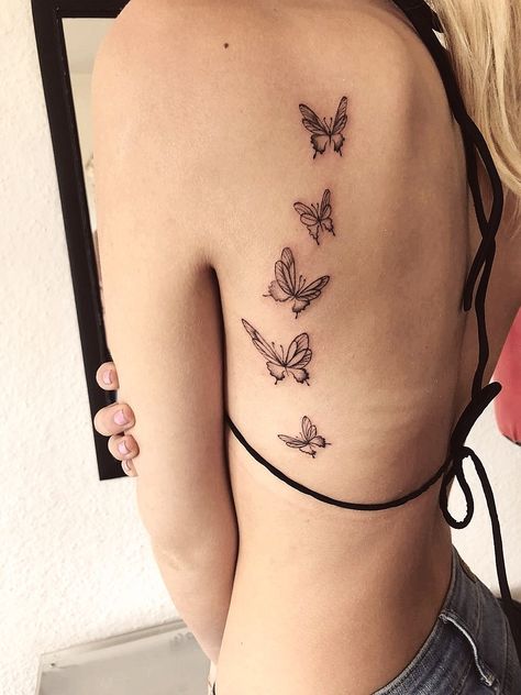 Butterfly Tattoo Going Down Back, Butterfly Tattoo Down Back, Back Tats Women Butterflies, Butterfly Tattoo On Sternum, Tattoo Upper Back Women, Back Tattoo Women Butterflies, Butterfly Designs Tattoo, Multiple Back Tattoos Women, Butterflies Spine Tattoo