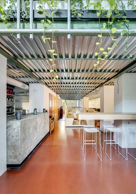 Add a modern, industrial touch to your home with a corrugated metal ceiling. Did you know metal buildings are extremely energy efficient and easy to maintain? Industrial Wall Shelves, Corrugated Tin, Loft Stil, Chinese Decor, Steel Roofing, Unglazed Porcelain, Floor Edging, Metal Siding, Restaurant Lighting