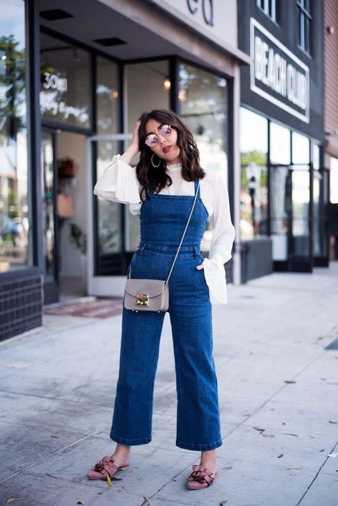 Dressed Up Overalls, Blue Denim Jumpsuit Outfit, Dressy Overalls Outfits, Overalls Work Outfit, Jumpsuit Outfit Casual Sneakers, Blue Overalls Outfit, Denim Jumpsuit Fall, Business Casual Jumpsuit, Blue Jumpsuits Outfit