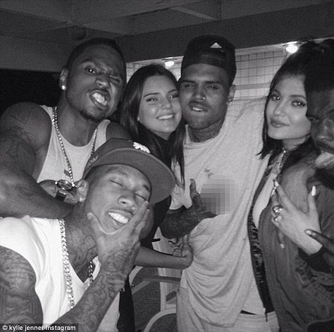 Charmer: The 25-year-old flashed a middle finger as the 18-year-old cuddled up with him Kylie Jenner Instagram Pictures, Chris Brown Party, Kylie Jenner Party, 2016 Rap, Instagram Kylie Jenner, Kendall Y Kylie Jenner, Robert Kardashian Jr, Brody Jenner, Kylie Jenner Instagram