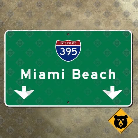 "To maximize the chances your package will arrive before Christmas, please order BEFORE November 24 Up for sale today is this Interstate 395/Miami Beach sign, from Florida. Made to the exact state standard as used along the roads to the present day. I can, of course, make this route marker with any route of your choice. Here is your chance to own a beautiful sign commemorating all the fun you and your loved ones have had in this lovely destination, without breaking the bank. I can make any destination sign; inquire about your home town! The sign is flat printed on 14-gauge steel, with completely accurate layout and fonts. It comes in your choice of six sizes: 15 x 9, 22.5 x 13.5, 35 x 21, 45 x 27, 70 x 42, or 90 x 54 inches. All of these are a precise rescaling of the original 12-foot free Miami Sign, Florida Miami Beach, Sign Road, Reflective Sign, Guide Sign, Decal Codes, Beach Sign, Miami Beach Florida, Beach Signs