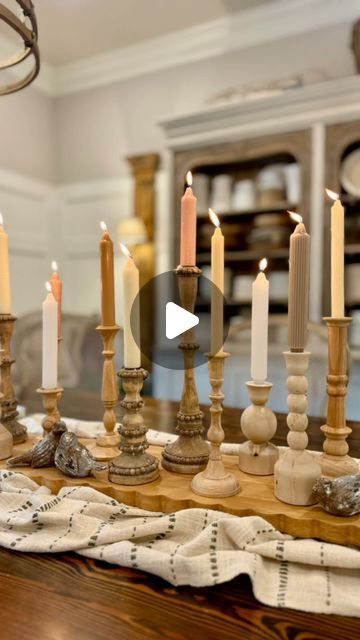 Tina Schaible on Instagram: "DINING ROOM TABLE RESTYLING for #tonitinatabletops.  I had this thought of alllll of my pretty wooden candlesticks simply decorating the length of my dining table.  Different candlesticks, different candles and I love how it turned out.  I hope this inspires you to shake it up a little and go un-matchy-matchy.  You know our @toni_marianna is whipping up something beyond wonderful…let’s go see!" Candlesticks On Dining Table, Tina Schaible, Toni Marianna, Different Candles, Wooden Candlesticks, Tall Candlesticks, Wooden Candle Sticks, Shake It, Room Table