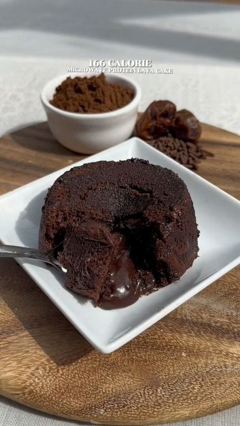 Microwave Protein Lava Cake Recipe ( 13g Protein, 166cal For all 🍫🍰🤎 #lavacake #166cal #lowcarb #lavacakerecipe #protein #proteincake #healthyrecipes #healthydesserts #healthyfood #healthyfoodrecipes #allaboutfood #yummycake #yumyum #desserts #dessertsofinstagram #bakedgoods #bakersofinstagram #cakebaker #baking #bakingexpart #chocolatecake #cakesofinstagram #cakeslove #chocolatelavacake | All about food | All about food · Original audio | Reels Protein Lava Cake, Protein Powder Cake Recipe, Protein Powder Cake, Lava Cake Recipe, Volcano Cake, Choco Lava, Oat Recipes, Lava Cake Recipes, All About Food