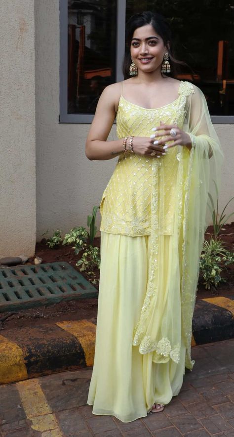 rashmika mandanna in a yellow sharara for goodbye promotions Rashmika Mandana Indian Outfits, Yellow Dresses Indian, Rashmika Mandana Outfits, Hairstyles For Sharara Dress, Yellow Indian Outfit, India Core, Yellow Sharara, Indo Western Outfits For Women, Indian Fits