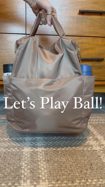 Brittani Boren • YOUTUBE MAMA on Instagram: "I call this my “ballpark bag” ⚾️ We have three boys in sports right now so things are little crazy on the weekends 🤪 I keep this bag stocked and ready to go so all I have to do is grab it on the way out to games! These are just a few things that I’ve found to be helpful for us at the ballpark! You can find this bag (which holds so much!) and the other items in the link in my bio! ⚾️🏀🏈" Sport Mom Bag Essentials, Baseball Mom Bag Essentials, Baseball Mom Bag, Mom Bag Essentials, Sports Mom Bag, Travel Baseball, Baseball Bag, Baseball Park, Stadium Bag