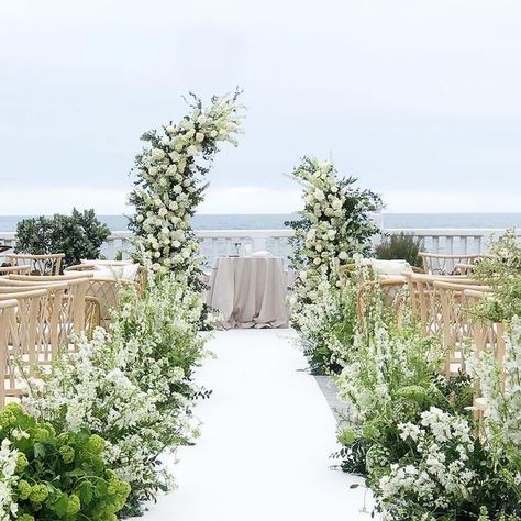 IXORA Florist on Instagram: "All about this past weekend’s dreamy wedding for A &L (the sweetest, most chill couple ever) at @shuttersca with @veroniqueevents {planner} @veroniqueevents {venue} @shuttersca {rentals} @hollywoodeventrentals {floral} @ixoraflorist #ixoraflorist #whitewedding #beachwedding #aisle #aisledecor #ceremonyflowers #meadowflowers #aislerunner #weddingarch #floralcolumns" Curved Aisle Wedding, Floral Aisle Runner Wedding, Simple Wedding Aisle Decor, White Aisle Runner, Wedding Walkway Flowers Aisle Runners, Wedding Walkway, Aisle Runner Wedding, Wedding Dress Organza, Aisle Flowers