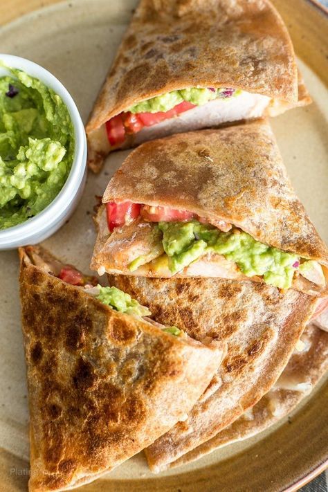 Pork Quesadillas with Homemade Guacamole make a perfect back-to-school snack or meal. Pre-marinated sauteed pork in a whole-wheat tortilla with a flavorful homemade guacamole, Mexican-blend cheese and tomato slices. #ad #RealFlavorRealFast - www.platingpixels.com Pork Quesadillas, Cheese And Tomato, Whole Wheat Tortillas, Hot Sandwich, Homemade Guacamole, Amazing Appetizers, School Snack, Tomato And Cheese, Easy Casserole