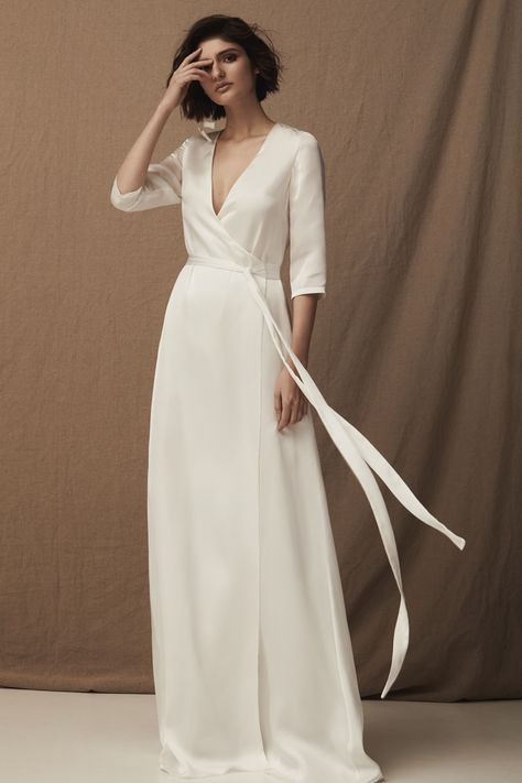 Wrap around wedding dress with long sleeves for older brides Wrap Wedding Dress, How To Dress For A Wedding, Sheath Wedding Gown, Stylish Wedding Dresses, Formal Dresses For Weddings, Sophisticated Dress, Bride Gowns, Gorgeous Wedding Dress, Gowns With Sleeves