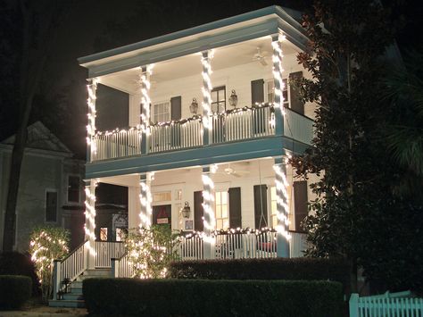 lighted columns and garland Column Christmas Lights, Christmas Lights On Columns, Charleston Christmas, Inspectah Deck, Christmas In, House Lights, Southern Architecture, Outside Christmas Decorations, Cozy Cottages