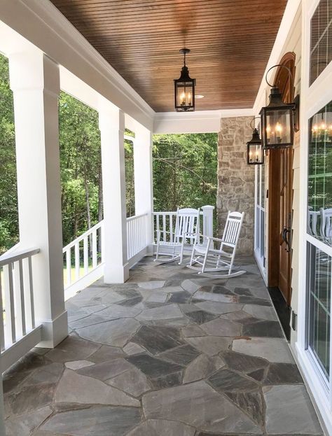 Love the flagstone and bead board on the ceiling. Wood Paneling Patio Ceiling, Vaulted Wood Porch Ceiling, Wood Panel Porch Ceiling, Wood Under Front Porch Ceiling, Front Porch With Barrel Ceiling, Stained Beadboard Ceiling Porch, Back Patio Ceiling Ideas, Headboard Porch Ceiling, Porch Ceiling Beadboard