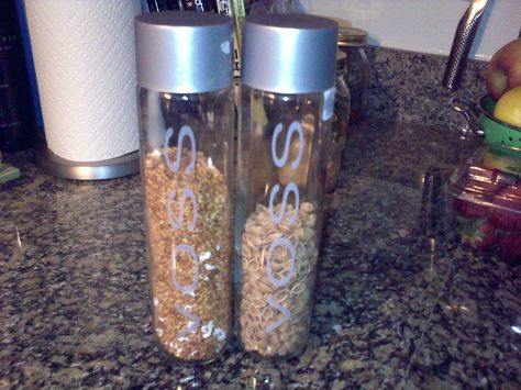 One of my favorite things to do is figure out how to repurpose stuff around my home.  We used to buy lots of bottle water, so I’ve accumulated a ton of these Voss glass bottles.  The mouth of… Repurpose Glass Bottles, Reuse Water Bottles, Repurpose Glass Jars, Voss Water Bottle, Voss Water, Water Bottle Crafts, Repurposing Ideas, Organized Lifestyle, Grain Storage