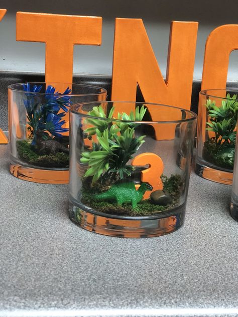 Centerpiece For Dinosaur Party, Jurassic World Birthday Party Centerpieces, Dinosaur Birthday Party Centerpieces Diy, Dinosaur Table Centerpiece Diy, Dinasour Centerpiece, The Good Dinosaur Centerpieces, Jurassic Park Centerpieces Diy, Centerpieces Dinosaur Party, Centerpieces For Dinosaur Party